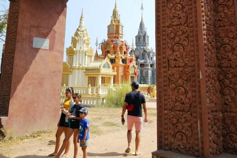 Boat trip to silk island with English speaking guide - First stops: pagoda visit and the school moment (subject to schedule)