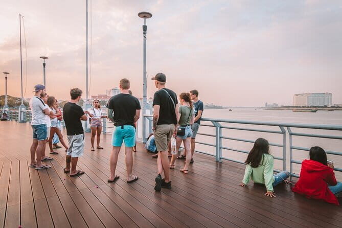 Riverside Walking Tour with Snack, Drinks & Local Ferry Ride - Starting at Mad Monkey and the quick Tuk-Tuk hop