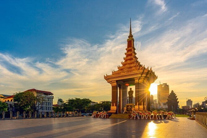 Riverside Walking Tour with Snack, Drinks & Local Ferry Ride - Riverside walk toward Royal Palace sight lines