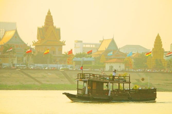 Riverside Walking Tour with Snack, Drinks & Local Ferry Ride - Snack stop: Cambodian bread plus deep-fried frogs and bugs